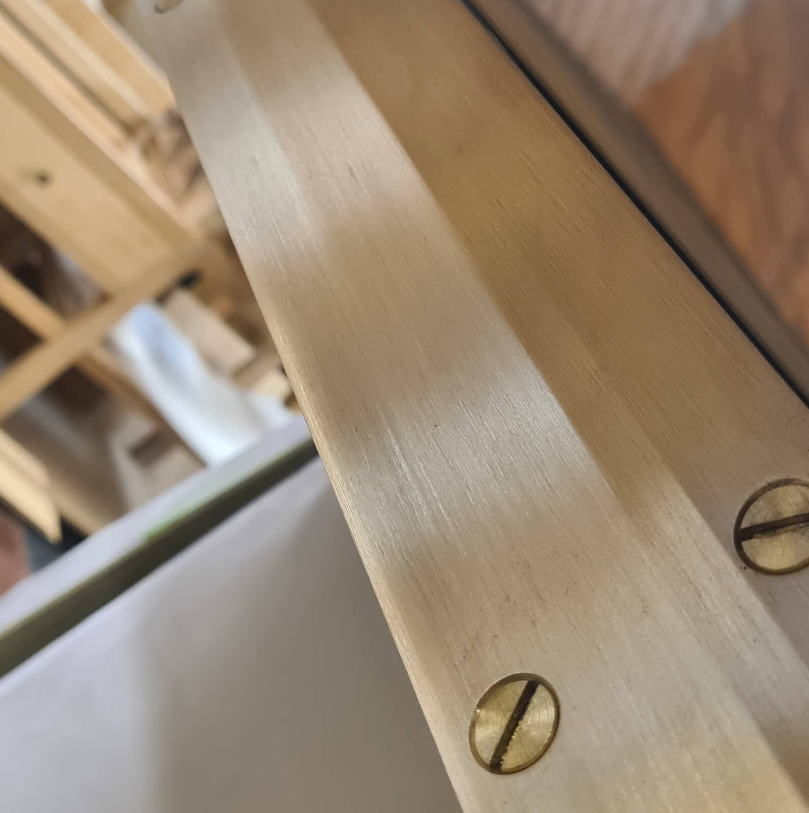 Bespoke shaped brass trim for a kitchen