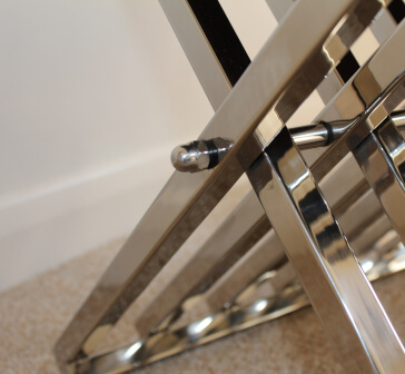 Mirror polished stainless steel luggage rack